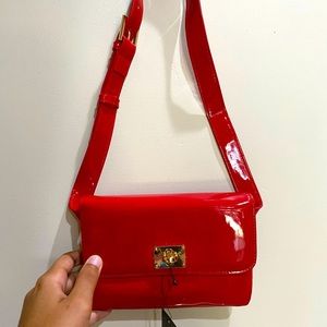 Red purse/belt bag with gold accents